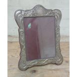 A hallmarked silver photograph frame 30cm x 23cm.