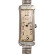 A FINE & RARE LARGE RECTANGULAR 18K WHITE GOLD MOVADO CURVEX BRACELET WATCH CIRCA 1936, REF. 6035