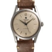 A GENTLEMAN'S SIZE STAINLESS STEEL UNIVERSAL GENEVE AUTOMATIC WRIST WATCH CIRCA 1950s, REF. 20219-