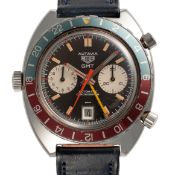 A GENTLEMAN'S SIZE STAINLESS STEEL HEUER AUTAVIA GMT AUTOMATIC CHRONOGRAPH WRIST WATCH CIRCA