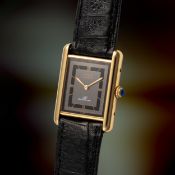 A RARE GENTLEMAN'S SIZE SOLID SILVER GILT CARTIER TANK MUST 
