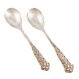 By Omar Ramsden, a matched pair of Arts and Crafts silver spoons, London 1919 and 1920, spot-