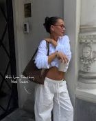 100 X BRAND NEW PIECES OF BRANDED WOMENS CLOTHING IN VARIOUS DESIGNS AND SIZES INCLUDING