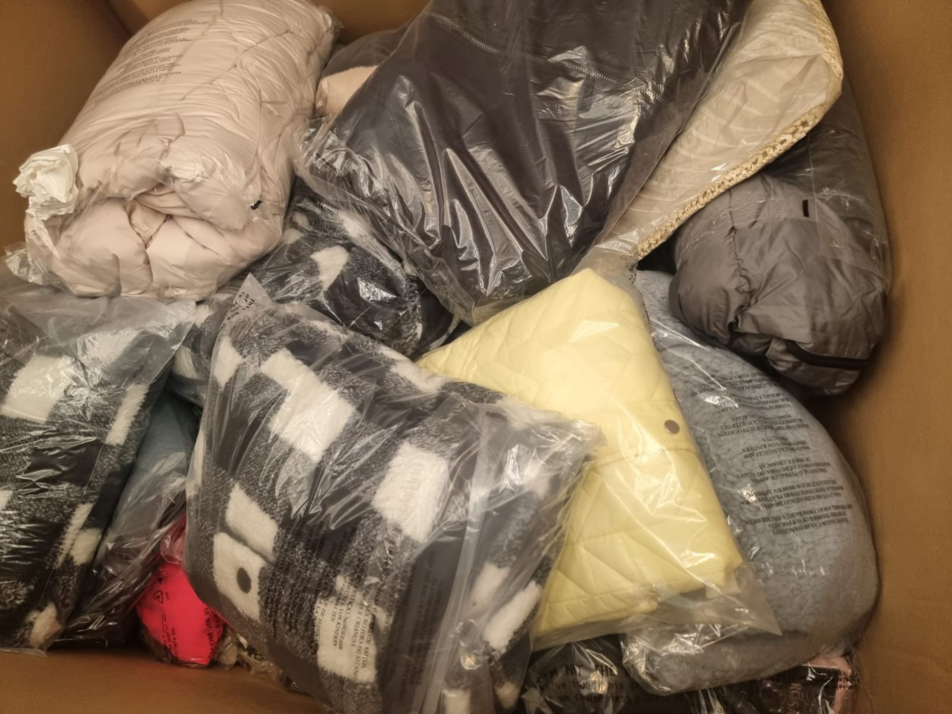 Trade Lot 100 x New & Packaged Mixed Items from A Major UK Retailer. May include: Jeans, Dresses,