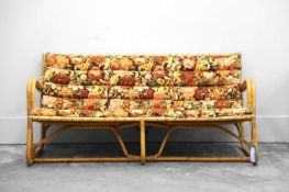 A three-seater bamboo and rattan sofa,