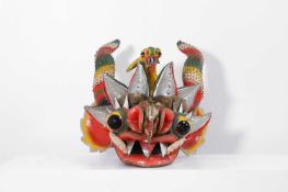A papier mâché Diablada mask,