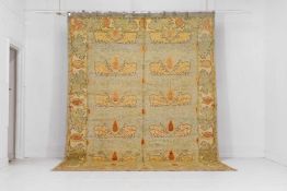 A wool carpet of Arts and Crafts design,