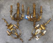 A pair of George III style giltwood appliqués,