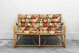 A two-seater bamboo and rattan sofa,