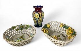 An Old Tupton Ware vase together with a two Italian pierced pottery and floral encrusted baskets