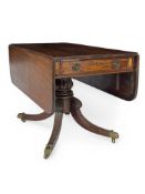 A Regency Irish mahogany drop flap pembroke dining table in the manner of Mack, Williams and Gibton