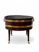 A George III mahogany and brass bound wine cooler on stand