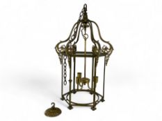 A late 19th century gilt brass hexagonal hall lantern