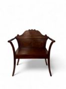 A 19th century George III style mahogany and sycamore marquetry hall seat
