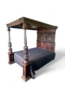 An Elizabeth I and later carved oak, ebony, sycamore and boxwood marquetry tester bed