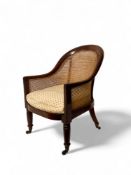 A late Regency mahogany bergere