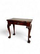 A George II carved walnut card table