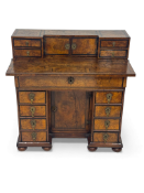 A late 17th / early 18th century burr walnut and ebony banded writing desk