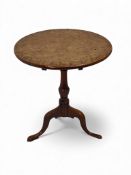 An unusual early 19th century pollard oak and oak tripod table