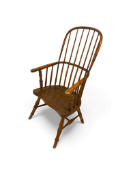 A 19th century ash and elm high stick back Windsor armchair