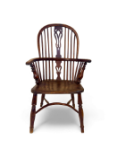 A mid 19th century yew, ash and elm high back Windsor armchair, Thames Valley