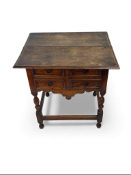 An early 18th century elm side table