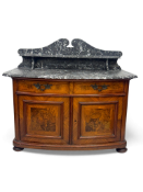 A 19th century French provincial kingwood and walnut bowfront wash stand