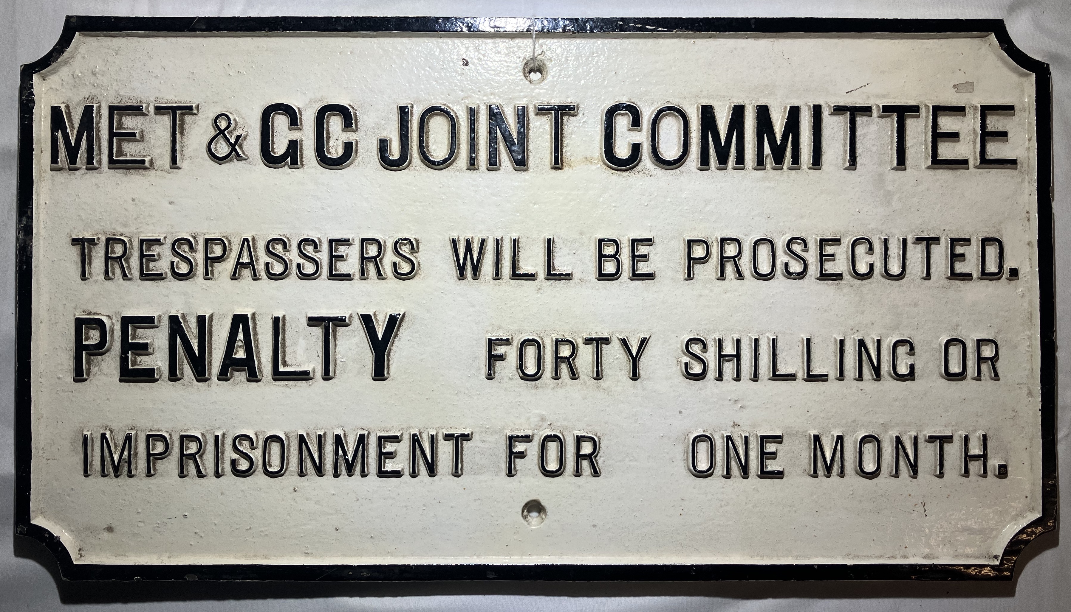 MET & Great Central Committee cast iron sign Trespassers will be prosecuted. Penalty forty shillings