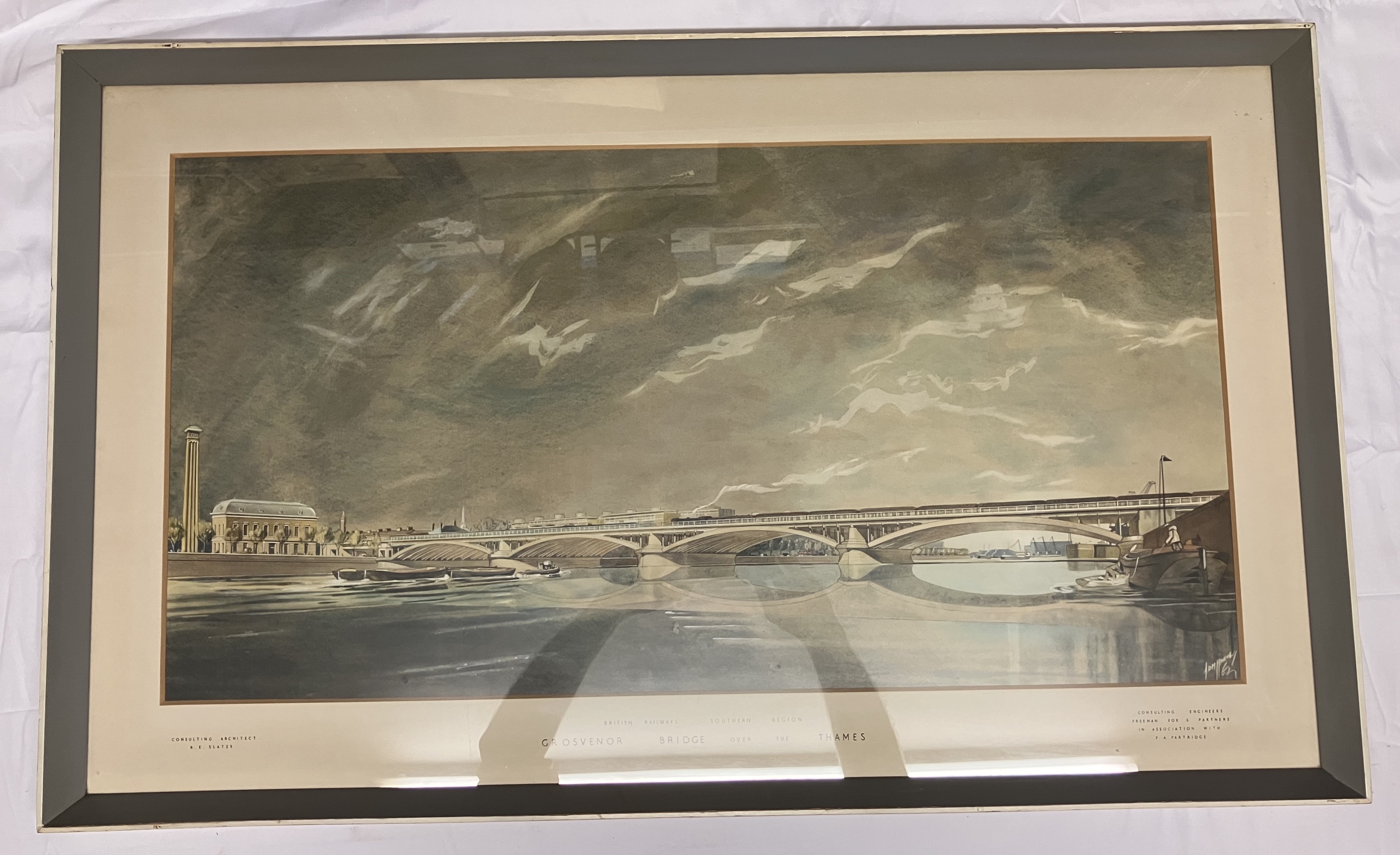 A framed print of British Railways Southern Region Grosvenor Bridge over the Thames. (24cm x 39cm)
