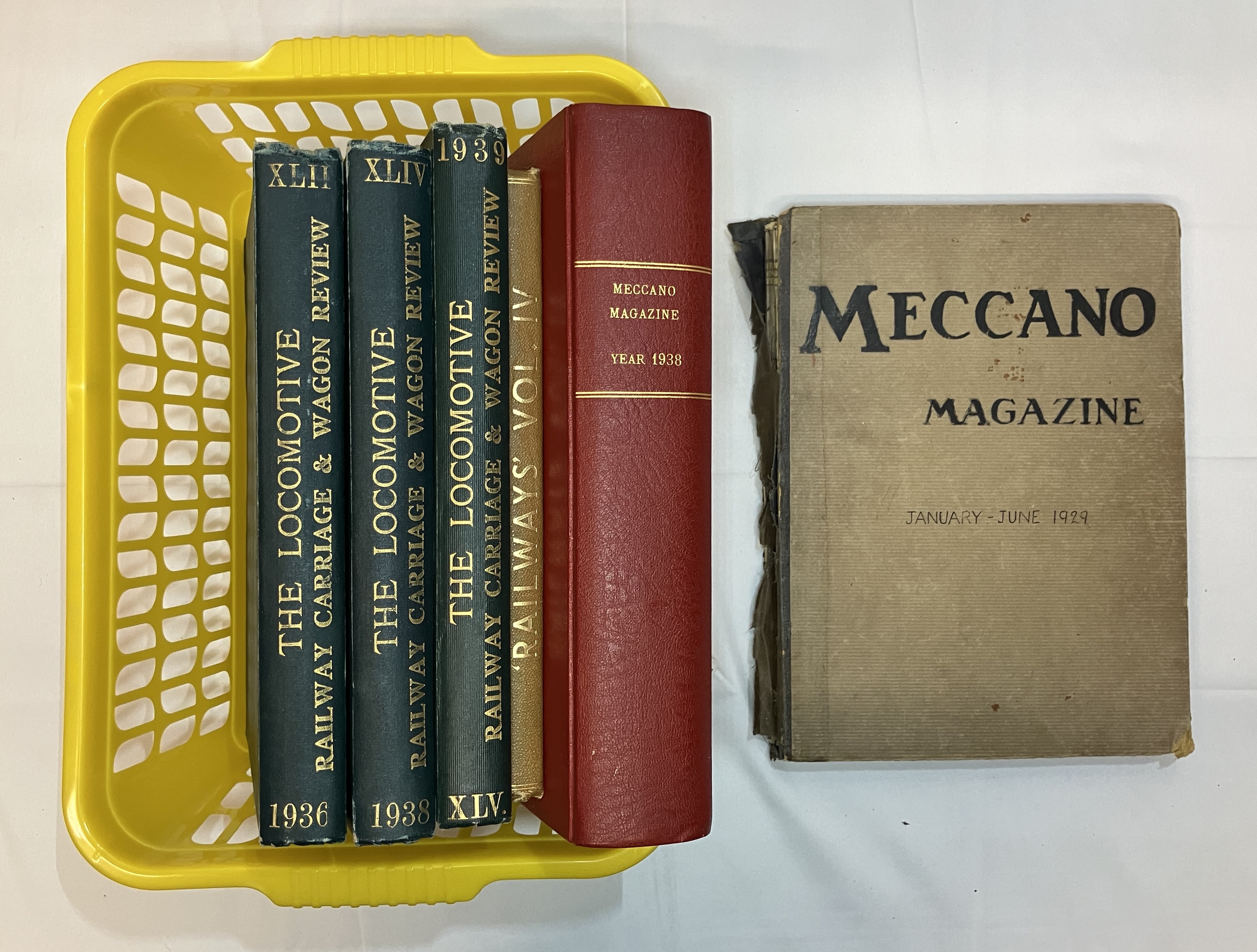 An assortment of bound volumes: The Locomotive Railway and Carriage Wagon Review 1936, 1938 and
