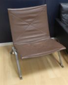 Een PK22 lounge chair, ontwerp: Poul Kjaerholm voor E. Kold Christensen.