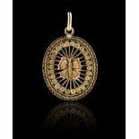 A filigree gold pendant