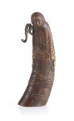 A carved horn powder flask