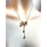 Schmetterlingscollier, cognac und weisse Brillanten ca. 1,30 ct.