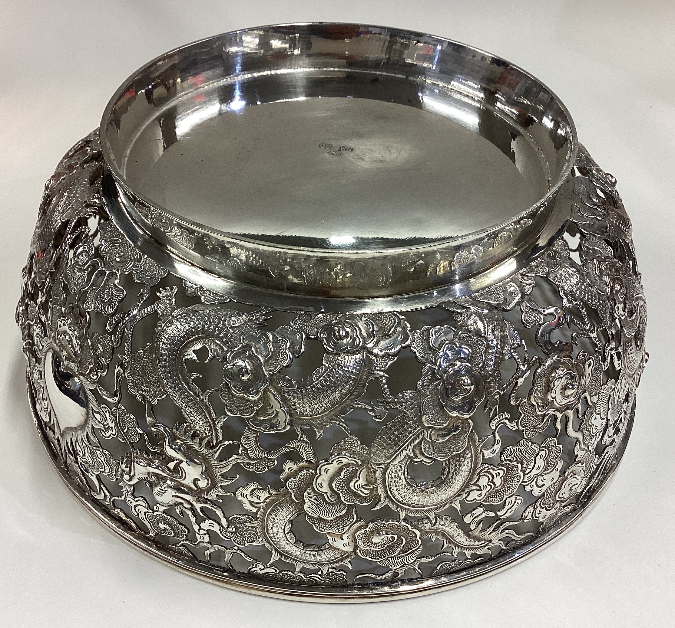 WANG HING: A large and fine 19th Century Chinese export silver bowl pierced with dragon and floral - Image 3 of 4