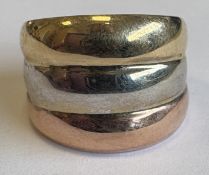 A 9 carat three-colour ring.