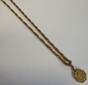 A 9 carat twist necklace with fob pendant.