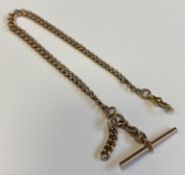 A 9 carat graduated curb link watch Albert.