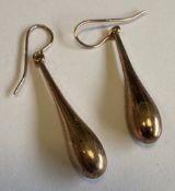 A pair of 9 carat rose gold drop earrings.