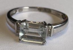 A 9 carat stone-set ring.