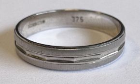 A modern 9 carat wedding band.