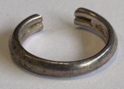 TIFFANY & CO: A small silver ring.