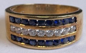 A sapphire and diamond three-row ring.