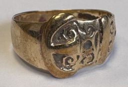 A 9 carat buckle-shaped ring.