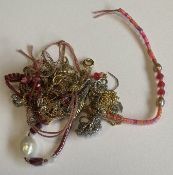 A collection of gold-mounted chains etc.