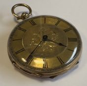 A 14 carat gold cased fob watch with gilt dial.