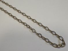 A 9 carat fancy link chain with ring clasp.