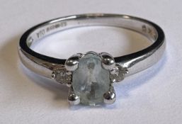 A small 9 carat single-stone ring.