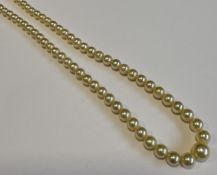 A 9 carat mounted pearl necklace.