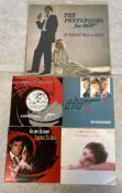 JAMES BOND: A selection of 7 inch and 12 inch vinyl record singles.